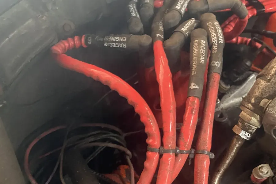 Engine bay with red ignition wiring
