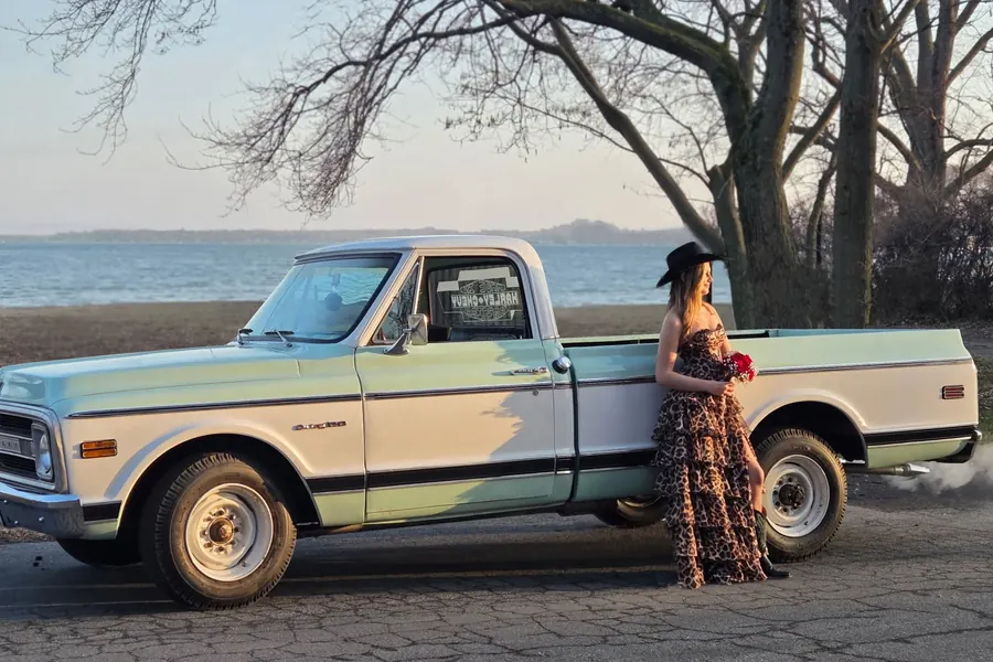 Vintage pickup parked by the water